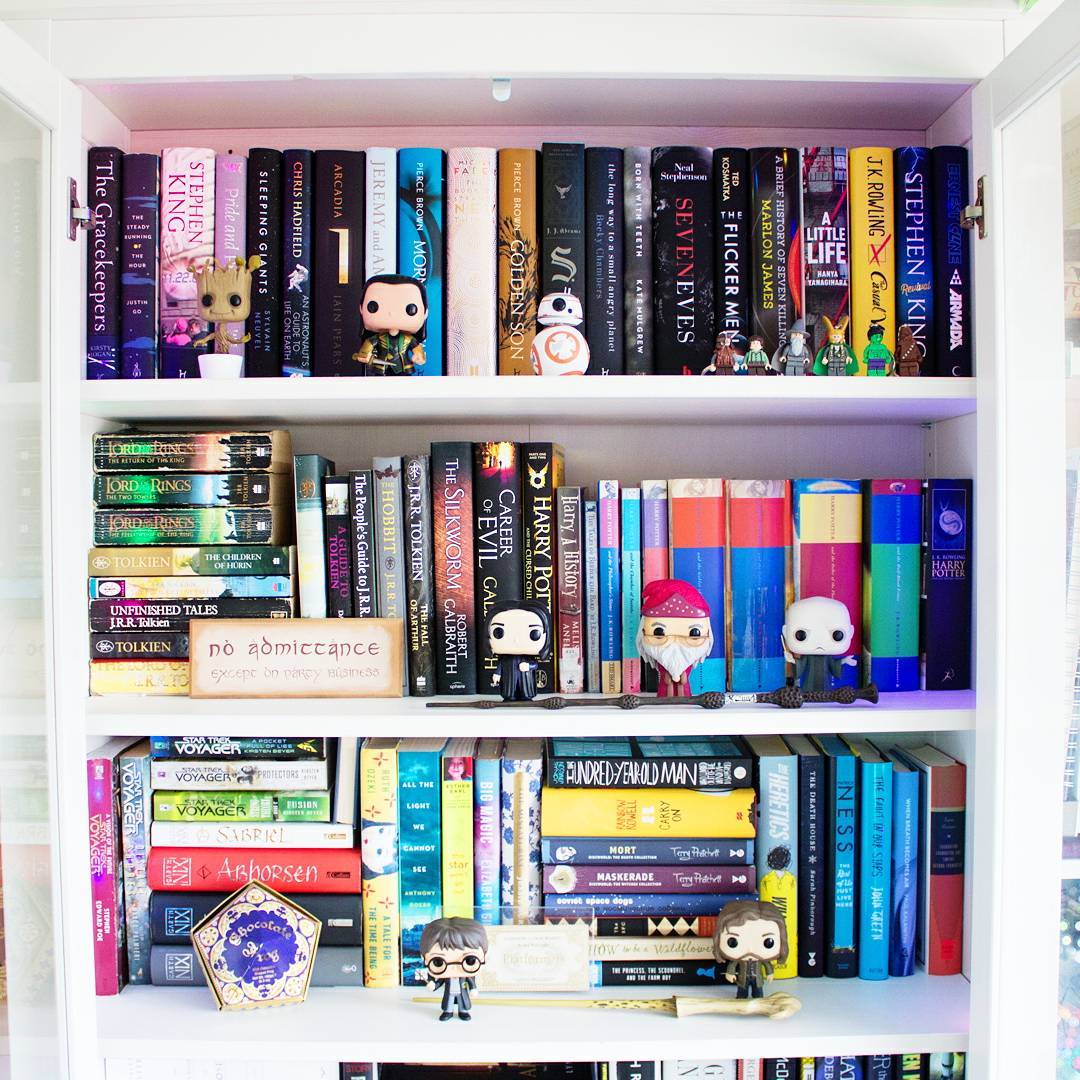 Advice on how to read more. Image shows books in bookcase with Pop Funko characters and Harry Potter memorabilia. 